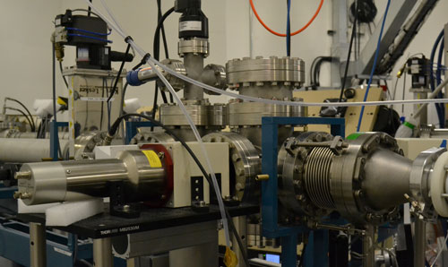 One of the accelerator beamline setups featuring complex connections of vacuum chambers, metal casings and tubing.